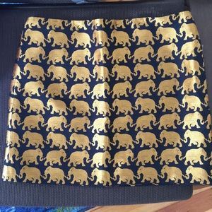 Skit embroidered with gold elephants.